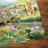 Puddle Ducks & Paddling 1000 Piece Jigsaw Puzzle by Gibsons made up detail on wooden table