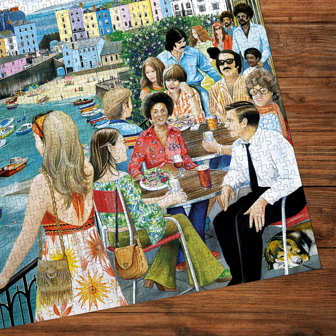 Dining at Tenby 1000 Piece Jigsaw Puzzle by Gibsons made up on wooden table cropped