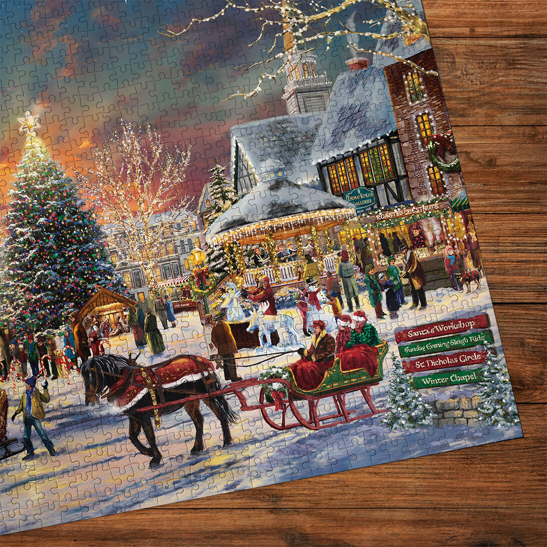 Gibsons The Christmas Festival 1000 piece jigsaw puzzle for adults made up detail on wooden table