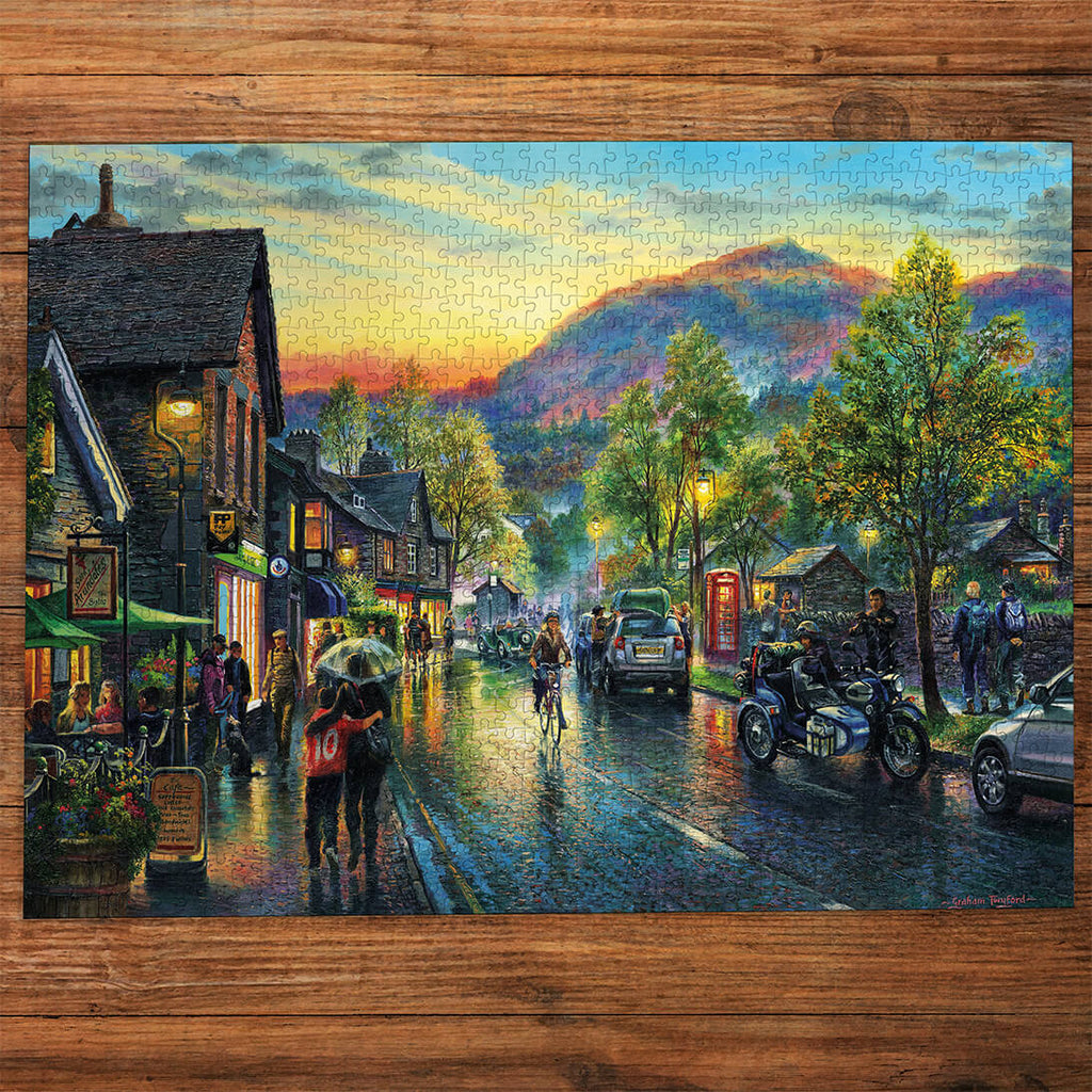 Gibsons Grasmere by Twilight 1000 Piece Jigsaw Puzzle for Adults made up on wooden table