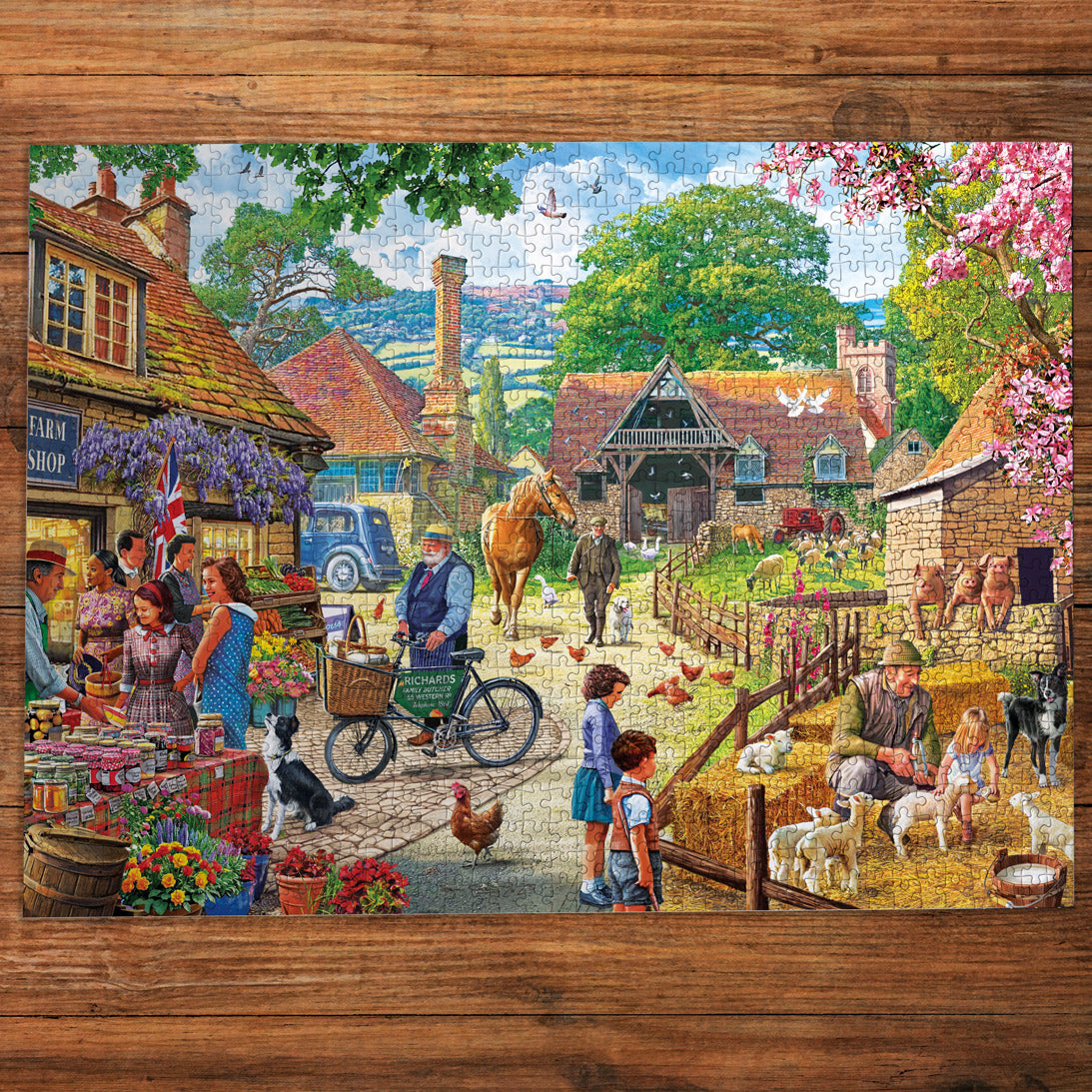 Jigsaw puzzle with a village scene on a wooden surface