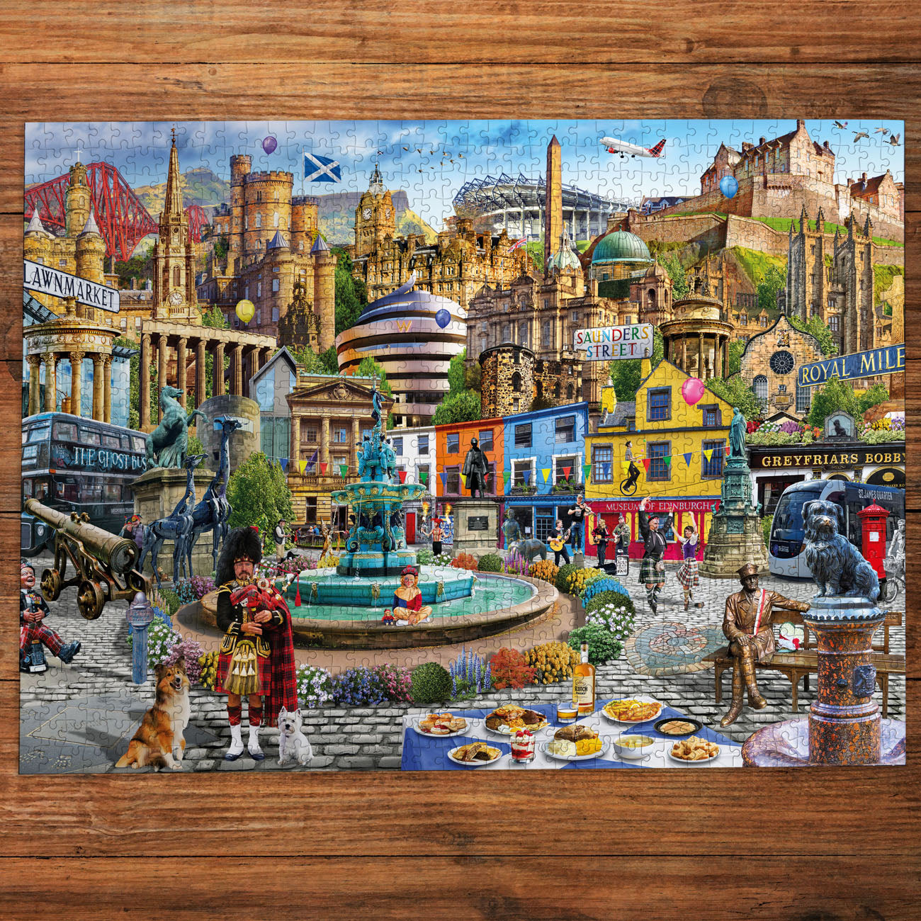 Gibsons puzzle featuring Edinburgh landmarks and a dancing couple by a fountain.