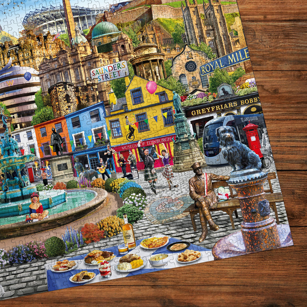 Gibsons puzzle featuring Edinburgh landmarks and a dancing couple by a fountain.