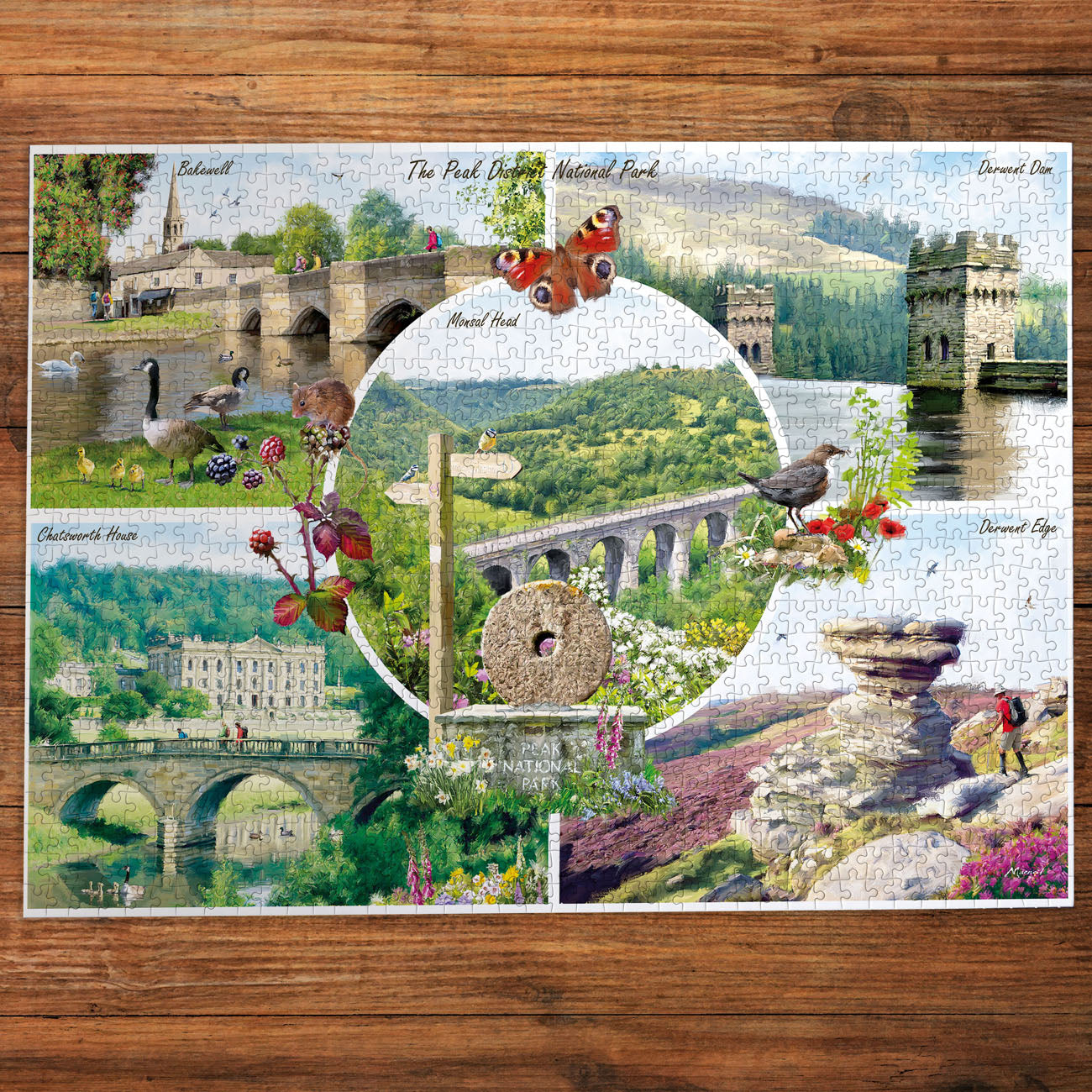 Gibsons puzzle featuring images of the Peak District on wooden table
