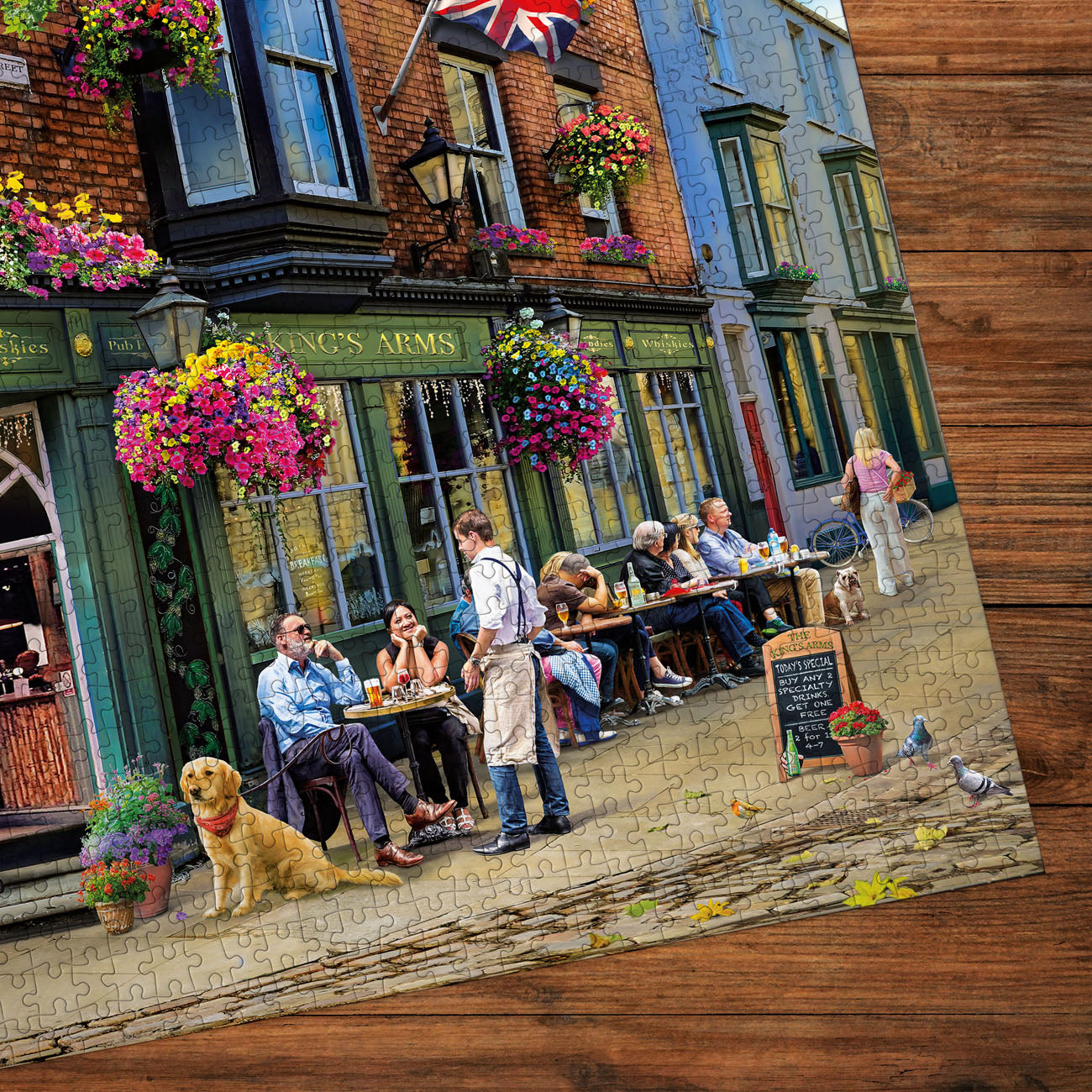 Jigsaw puzzle with a pub scene featuring people and a dog on a wooden surface.