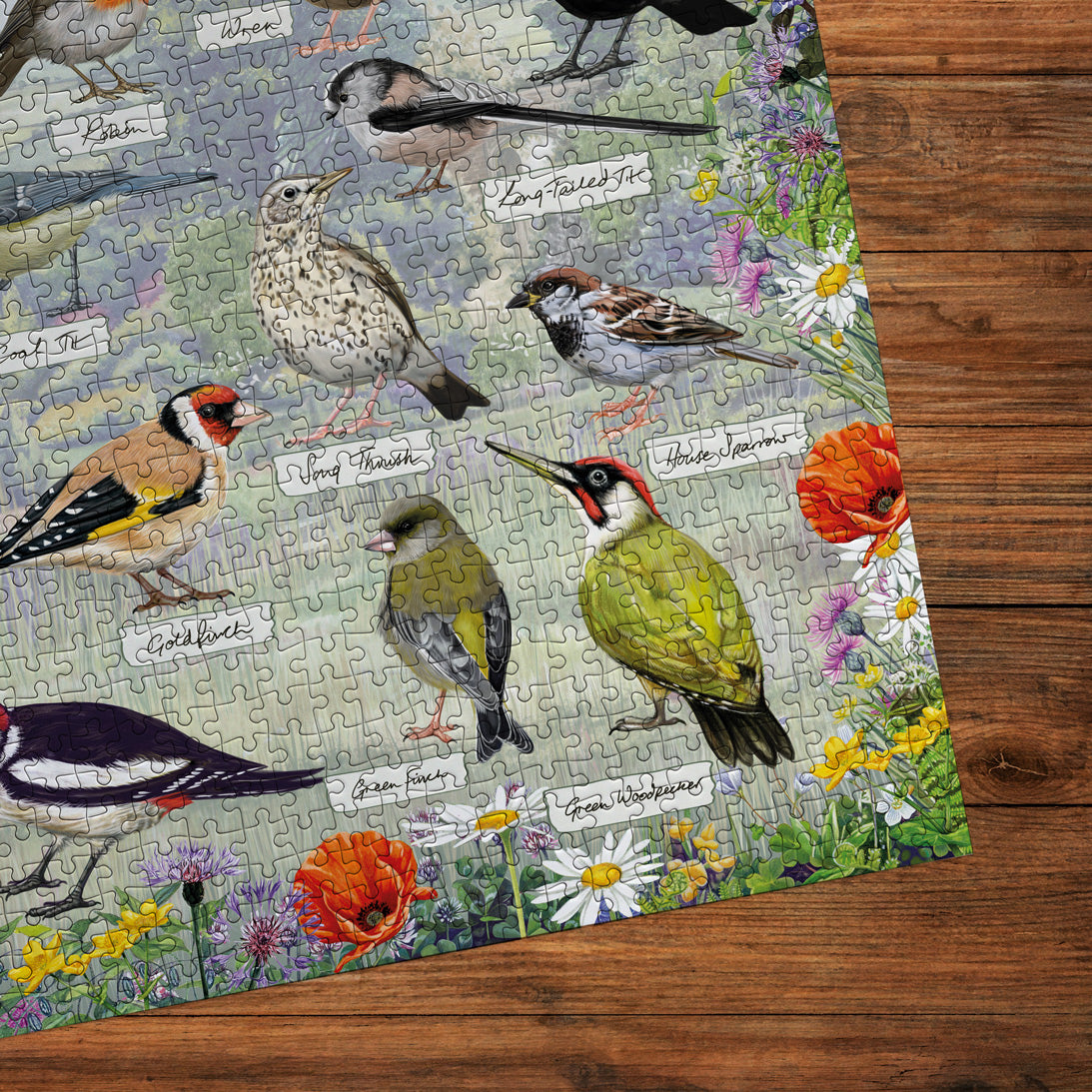 Bird-themed puzzle on a wooden surface