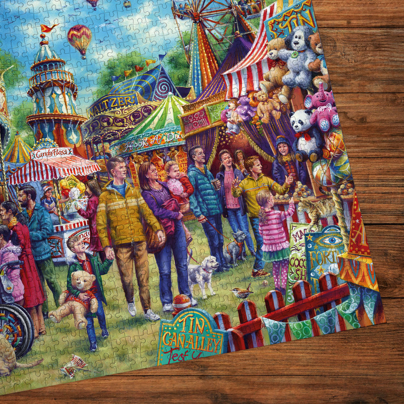 Colorful carnival-themed puzzle on a wooden surface