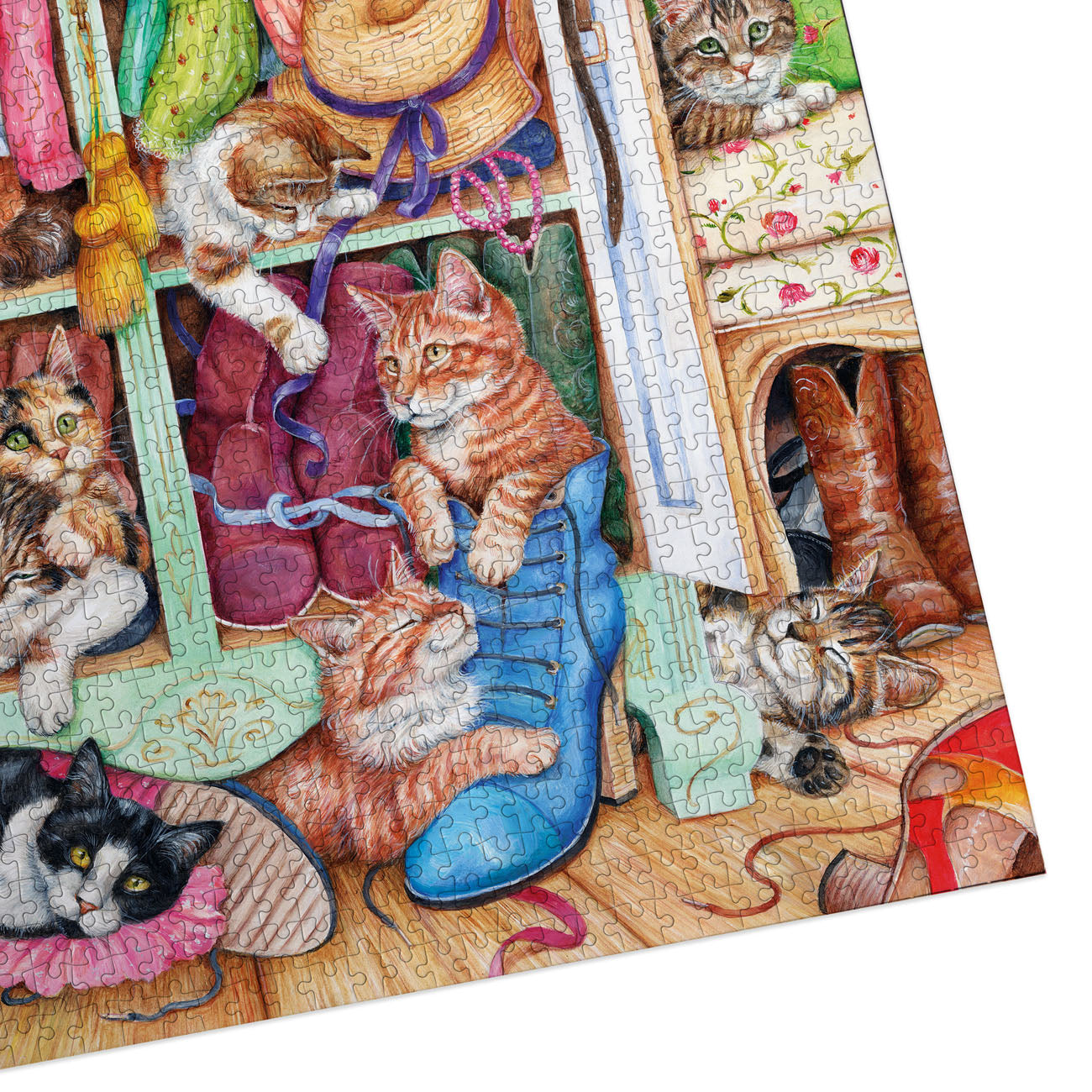 Jigsaw puzzle with cats and shoes on a white background