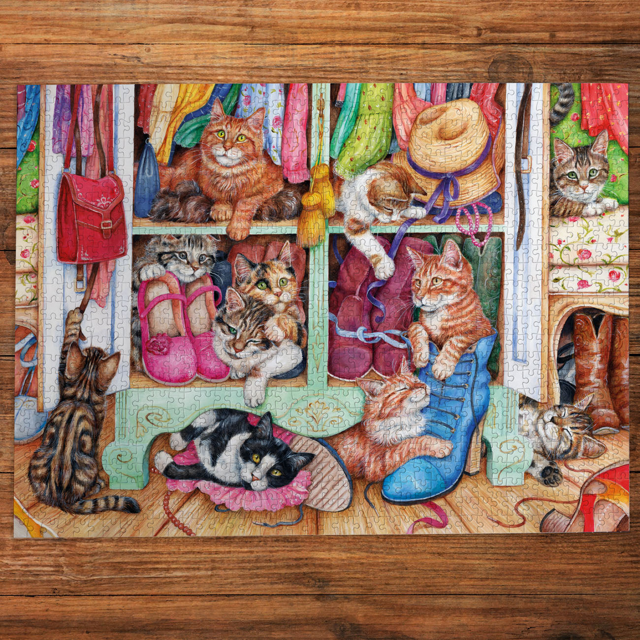 Jigsaw puzzle with cats in a shoe store design on a wooden surface