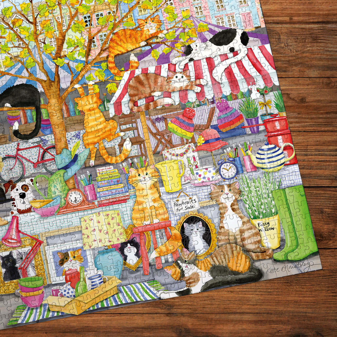 Colorful puzzle with various animals and objects on a wooden surface