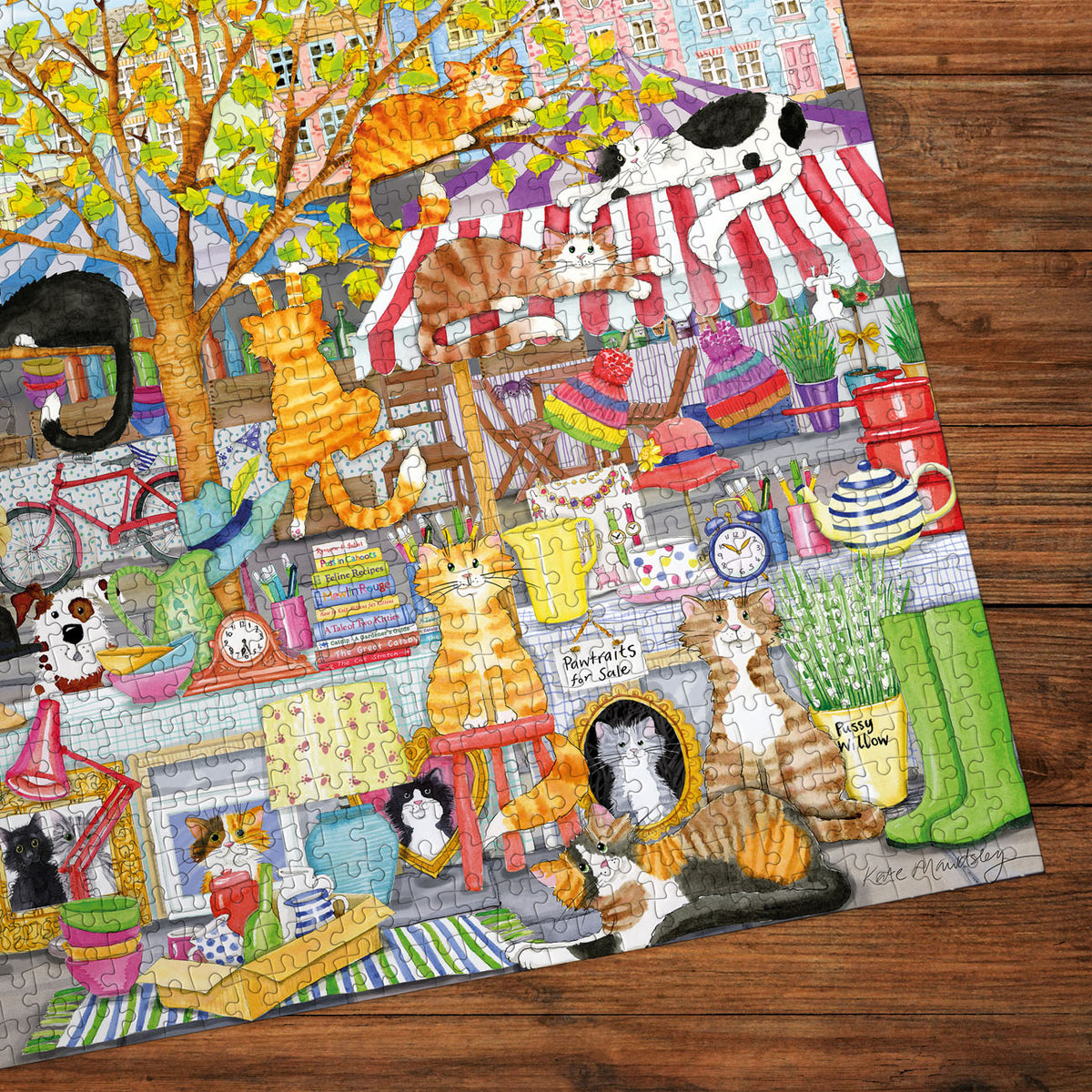 Colorful puzzle with various animals and objects on a wooden surface