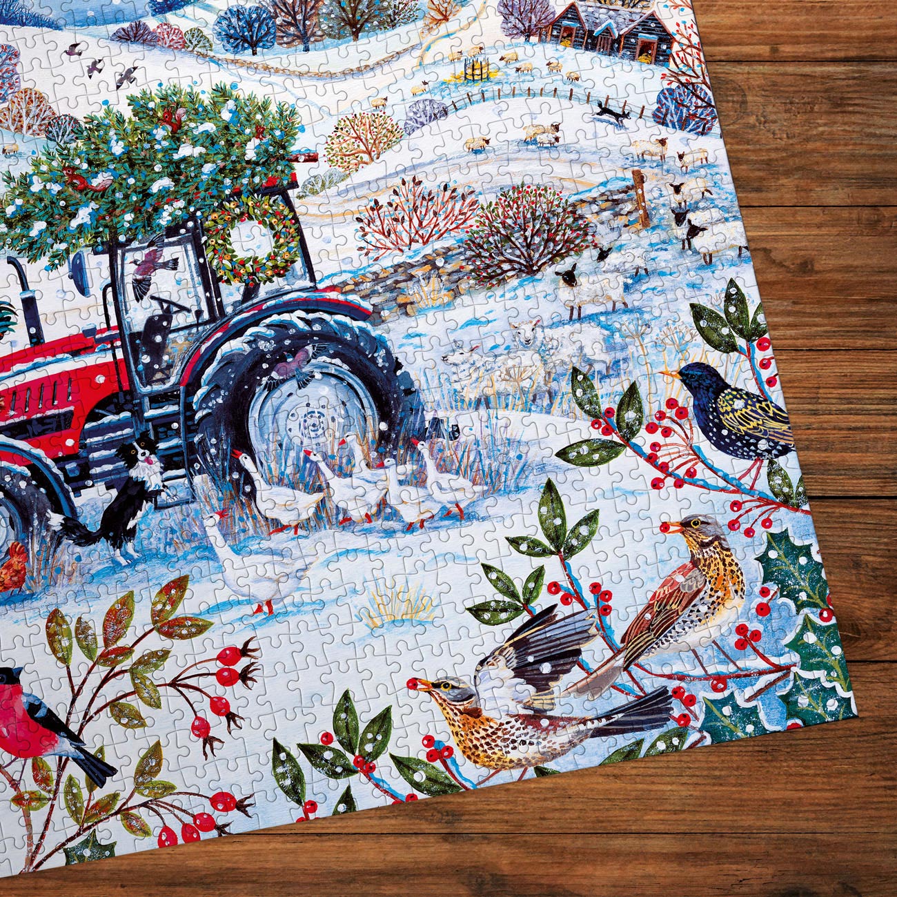 Jigsaw puzzle with a winter scene featuring a tractor, birds, and trees on a wooden surface.
