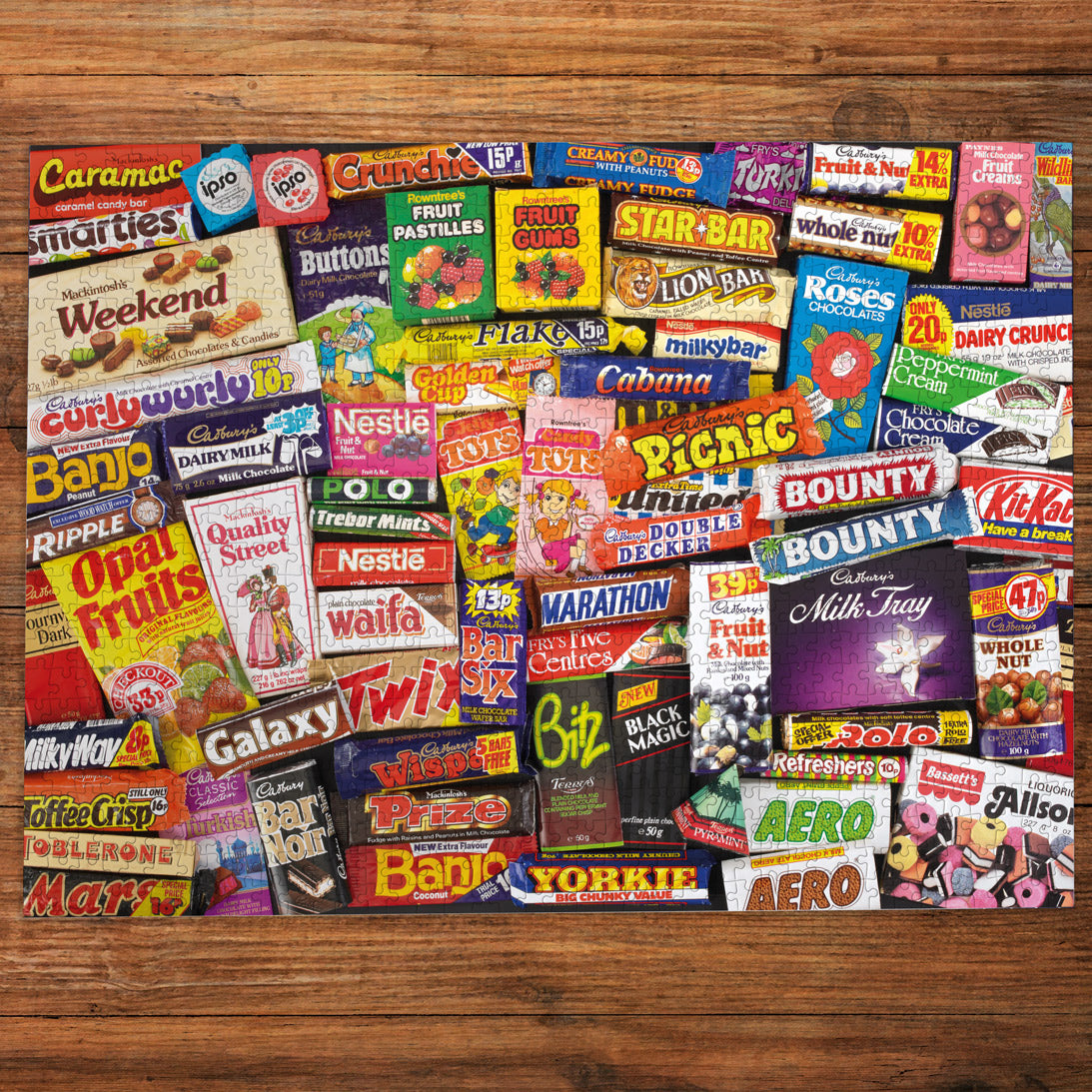 1980s Sweet Memories 1000 piece jigsaw puzzle from Gibsons made up on wooden table