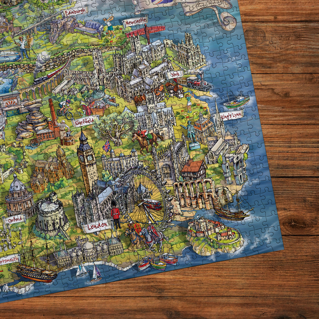 Jigsaw puzzle of a detailed map of London on a wooden surface