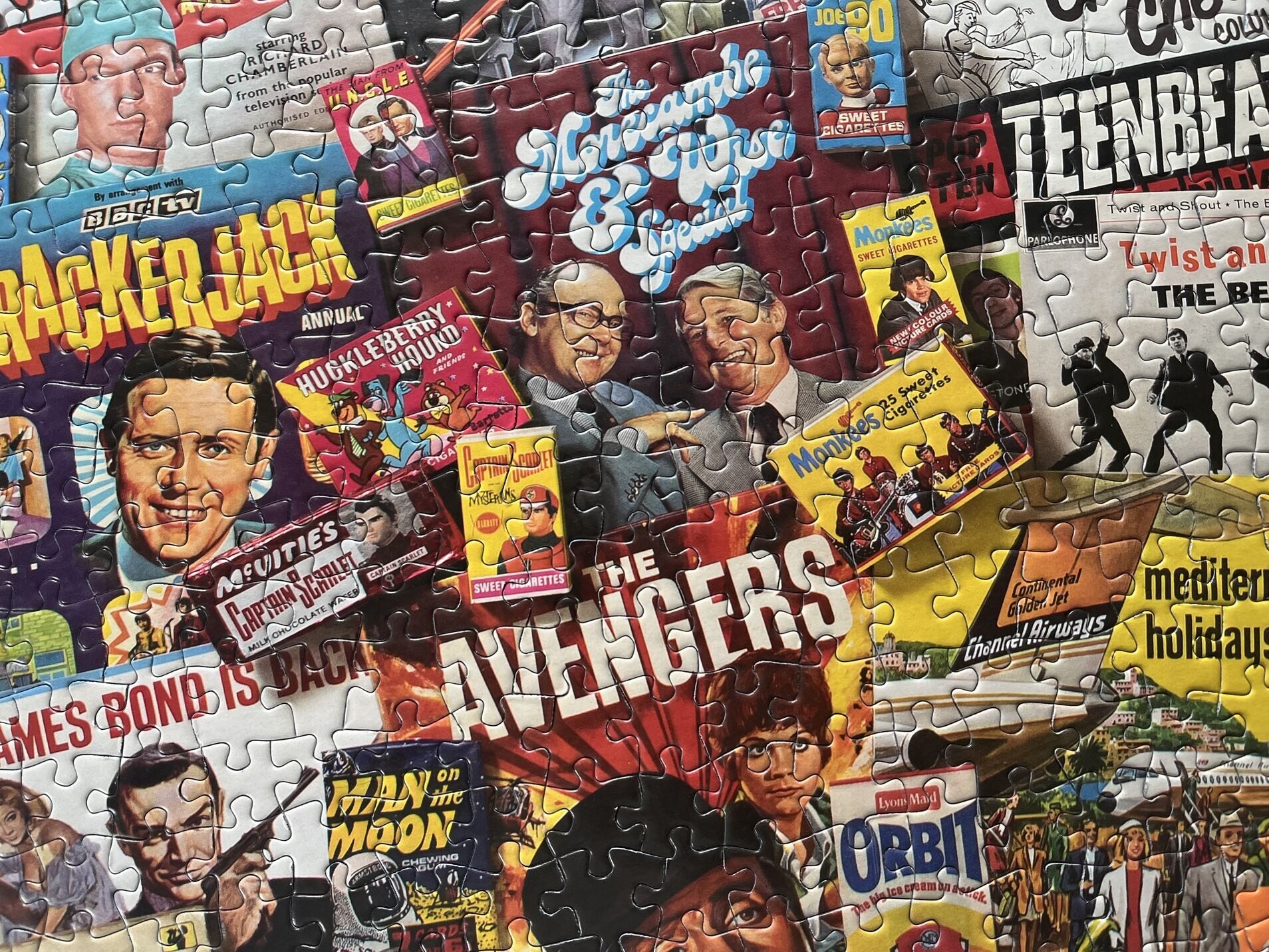Collection of vintage movie poster puzzles with various characters and titles.