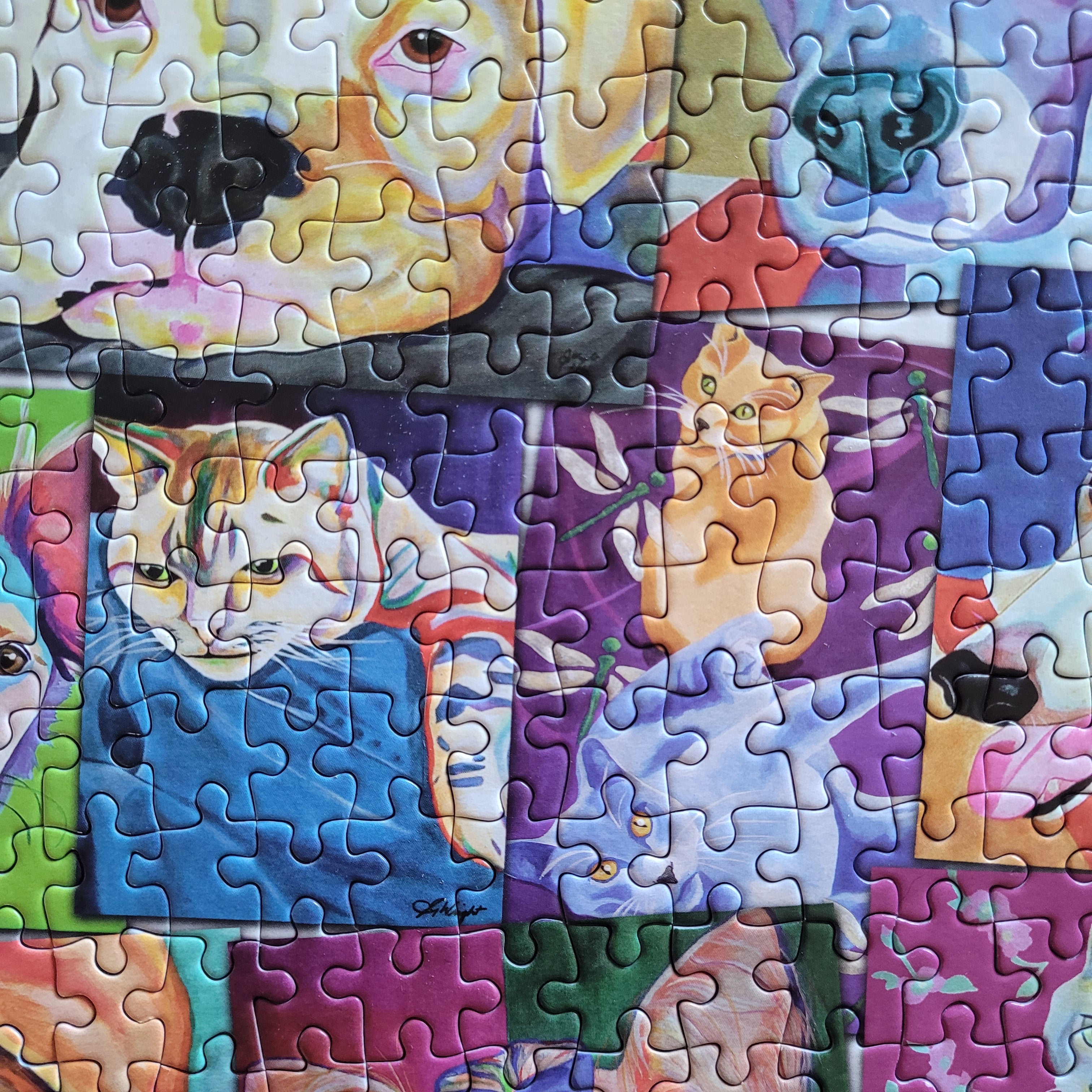 Colorful puzzle with animal illustrations on a white background