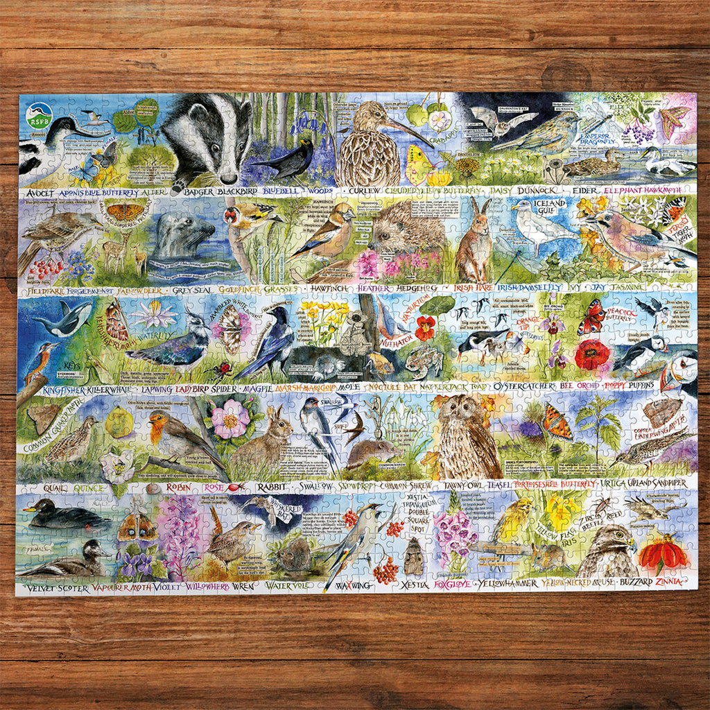RSPB Birdsong & Bluebells 1000 Piece Jigsaw Puzzle by Gibsons made up wooden table