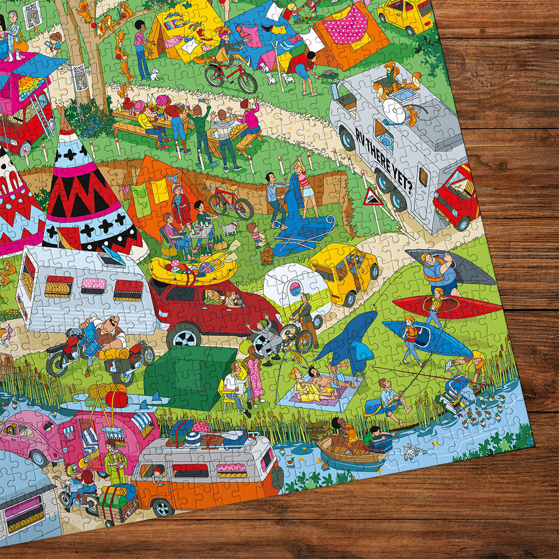 Jokesaws Campsite Capers 1000 Piece Jigsaw Puzzle by Gibsons detail made up on wooden table