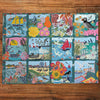 Coastal Calling 1000 Piece Jigsaw Puzzle by Gibsons made up on wooden table