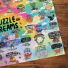 The Puzzle of Dreams 1000 Piece Jigsaw Puzzle by Gibsons made up detail on wooden table