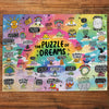 The Puzzle of Dreams 1000 Piece Jigsaw Puzzle by Gibsons made up on wooden table