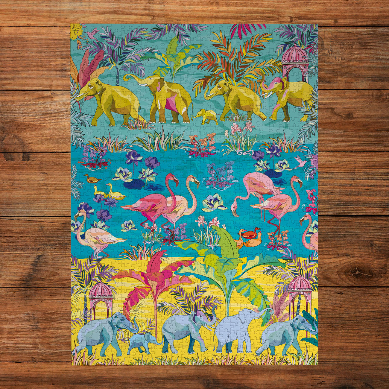 Jigsaw puzzle with colourful design of animals in a tropical setting on wooden background