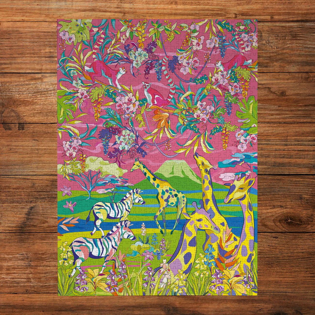 Gibsons Wild Savannah puzzle box with colourful animal design on a wooden background