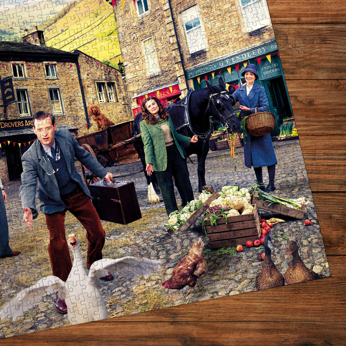 Jigsaw puzzle with a scene of people and animals on a wooden surface