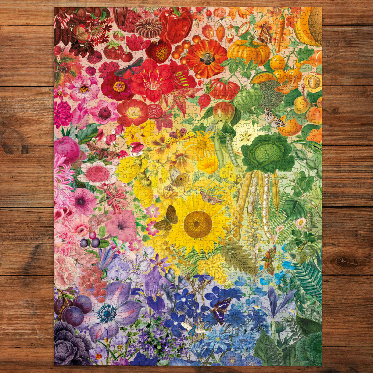 Coloruful floral and nature-themed jigsaw puzzle completed on a wooden surface