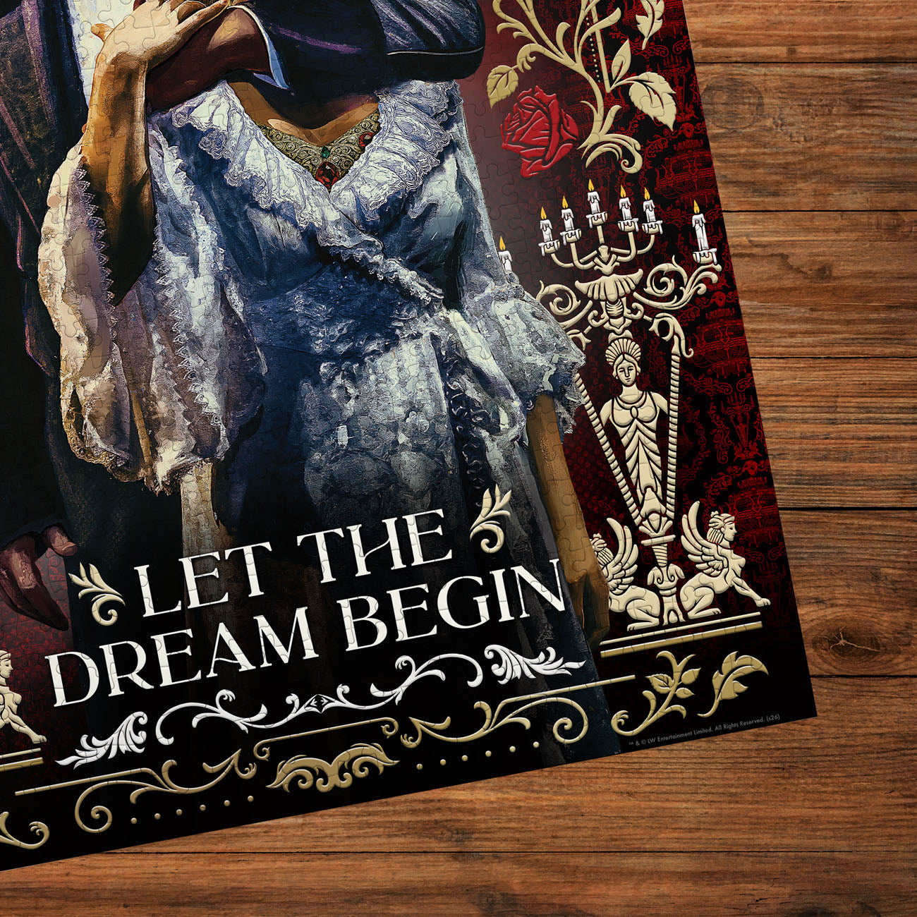 Poster with a vintage-style illustration of a woman and text 'Let the Dream Begin' on a wooden surface.