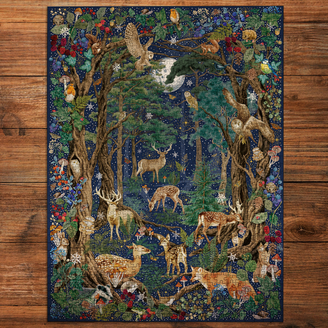 Beautiful jigsaw artwork of a forest scene with animals on a wooden surface