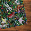 The Art File Winged Wonders 1000 Piece Jigsaw Puzzle by Gibsons made up detail on wooden table
