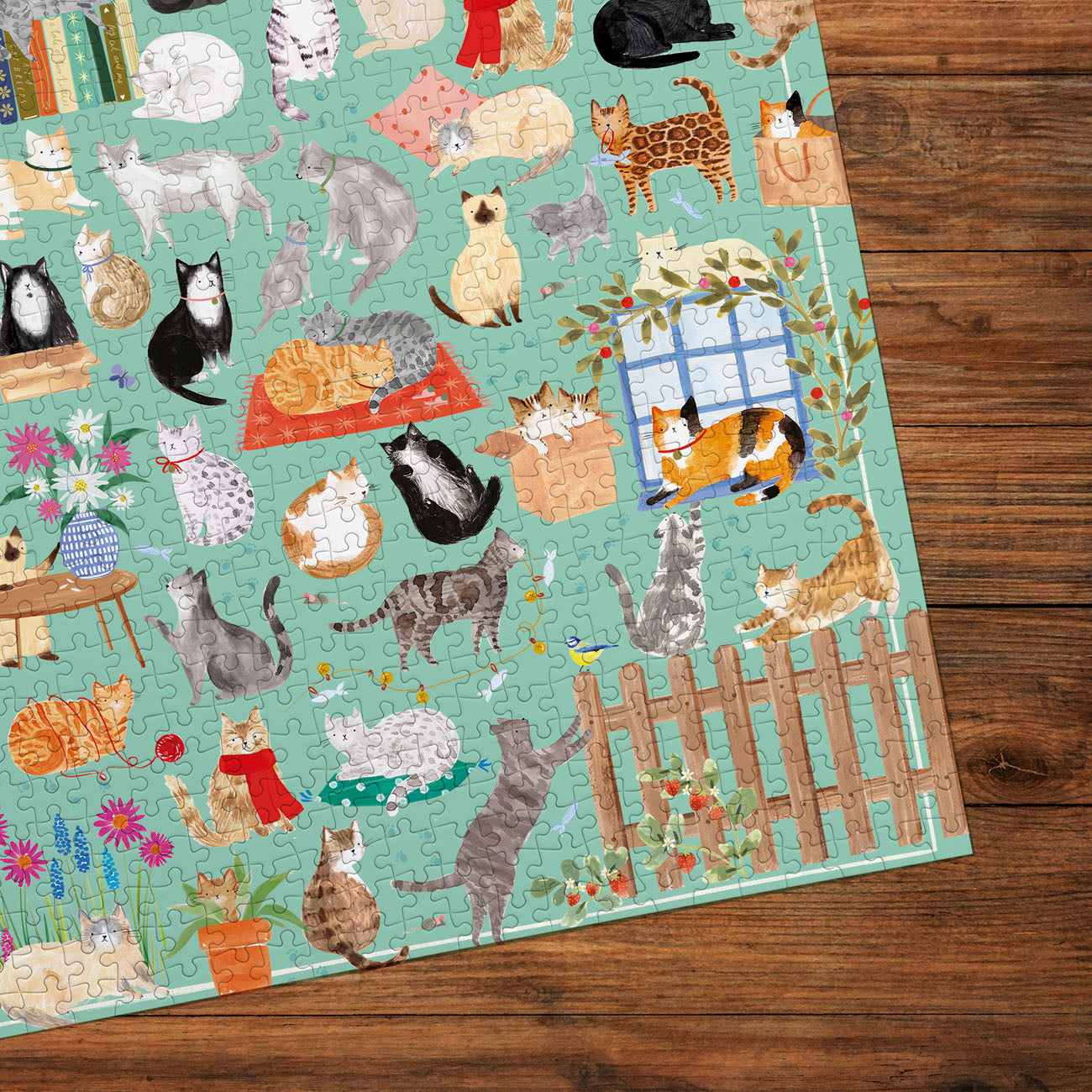 Jigsaw detail of various cats in different poses and outfits on a light green background