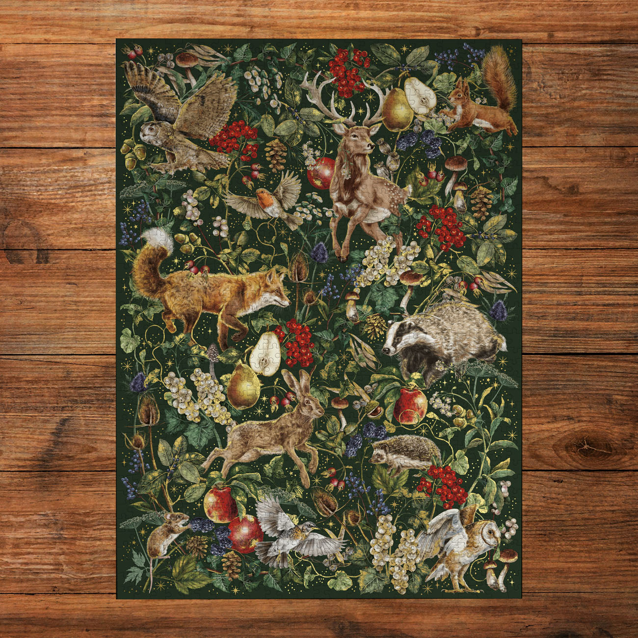 Decorative puzzle with nature-themed design featuring animals and plants on a wooden floor.