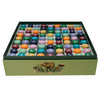 Set of colourful wooden checkers in a green box with a mouse illustration on a white background