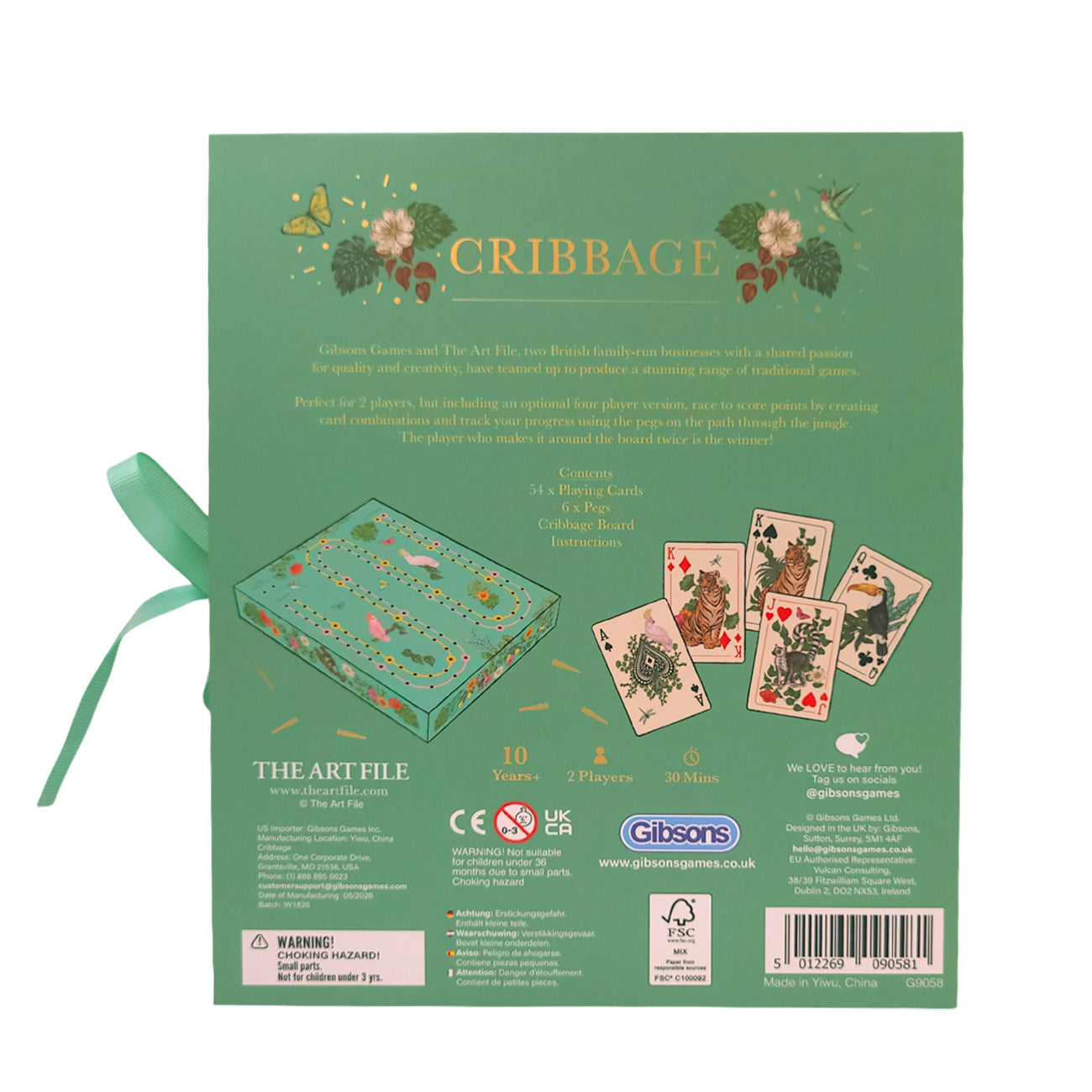 The back of a green Cribbage game box shown on a white background, with a mint green ribbon tied to the left side. The box includes product illustrations, rules text, player counts, and the Gibson brand logo.