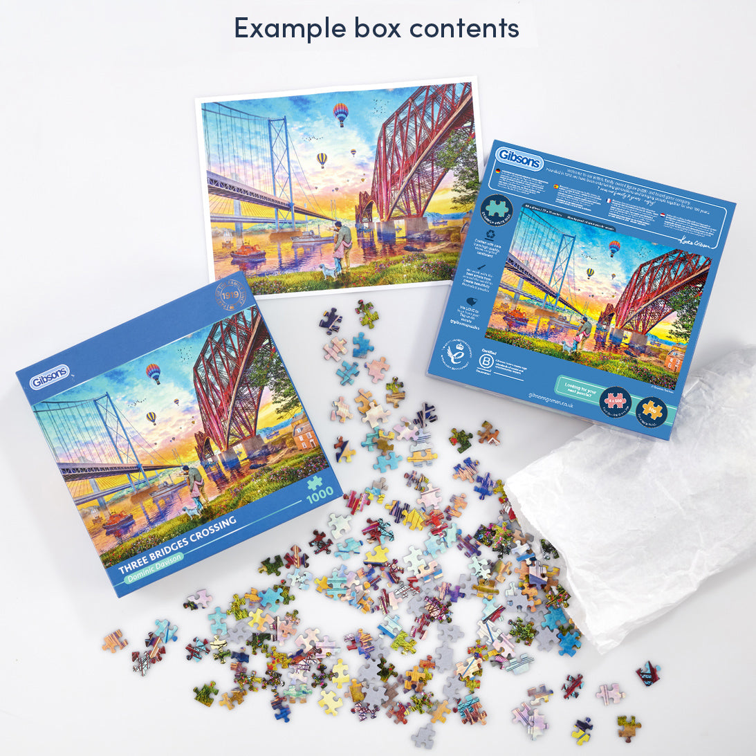 Gibsons puzzle set with bridge design, pieces scattered on a white surface