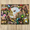 Haddon Hall 1000 Piece Jigsaw Puzzle by Gibsons made up on wooden table